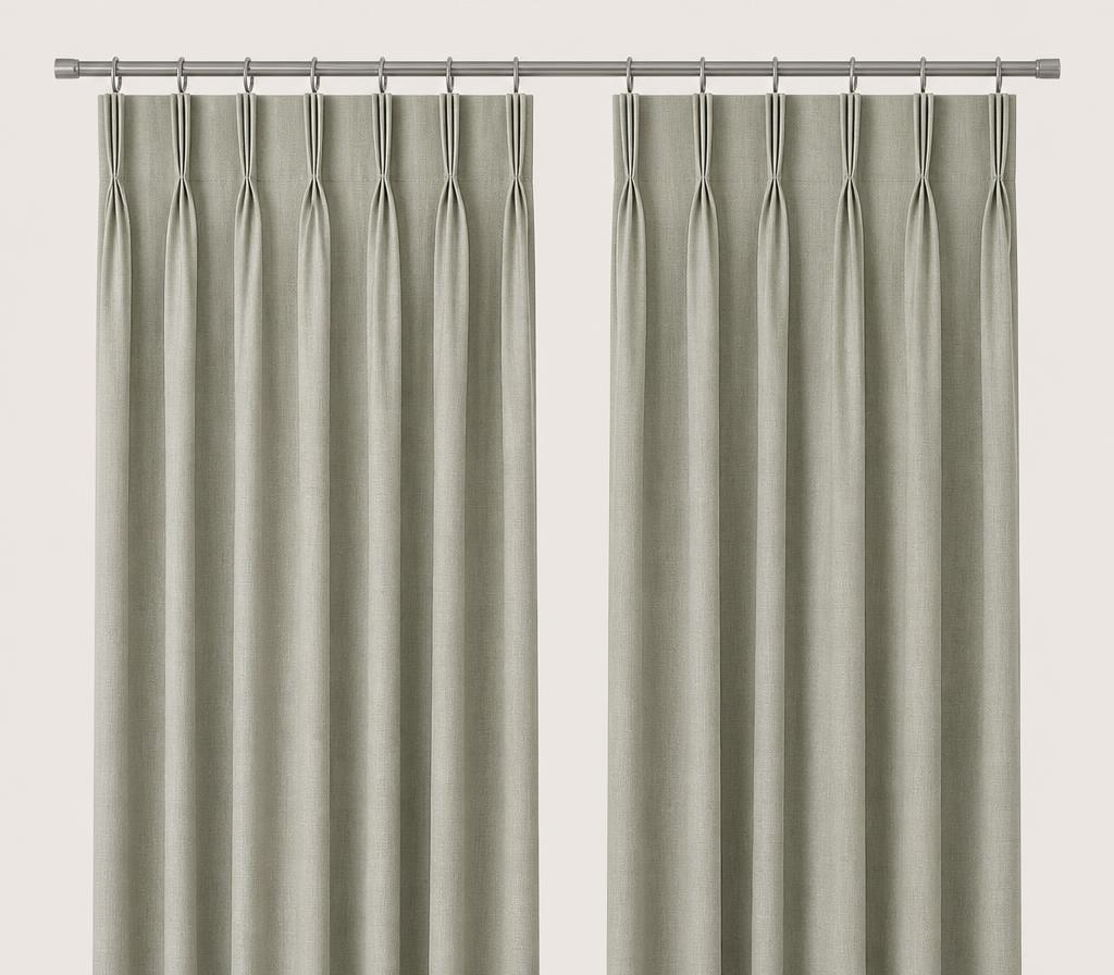 Pale linen curtains with a hand-stitched double pinch pleat heading