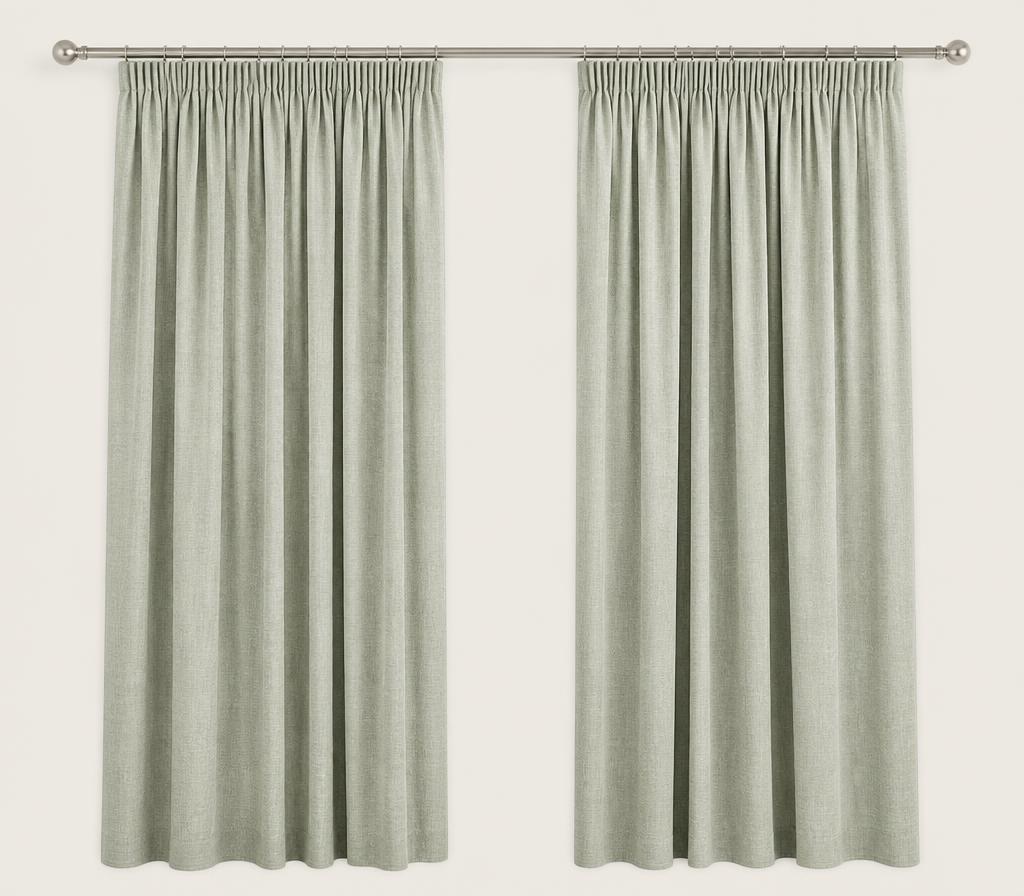 Pale linen curtains with a gathered pencil pleat heading on a steel pole